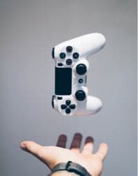 hand throwing a controller in the air